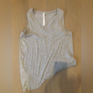 Lululemon grey asymmetrical tank. Worn once. Perfect condition.